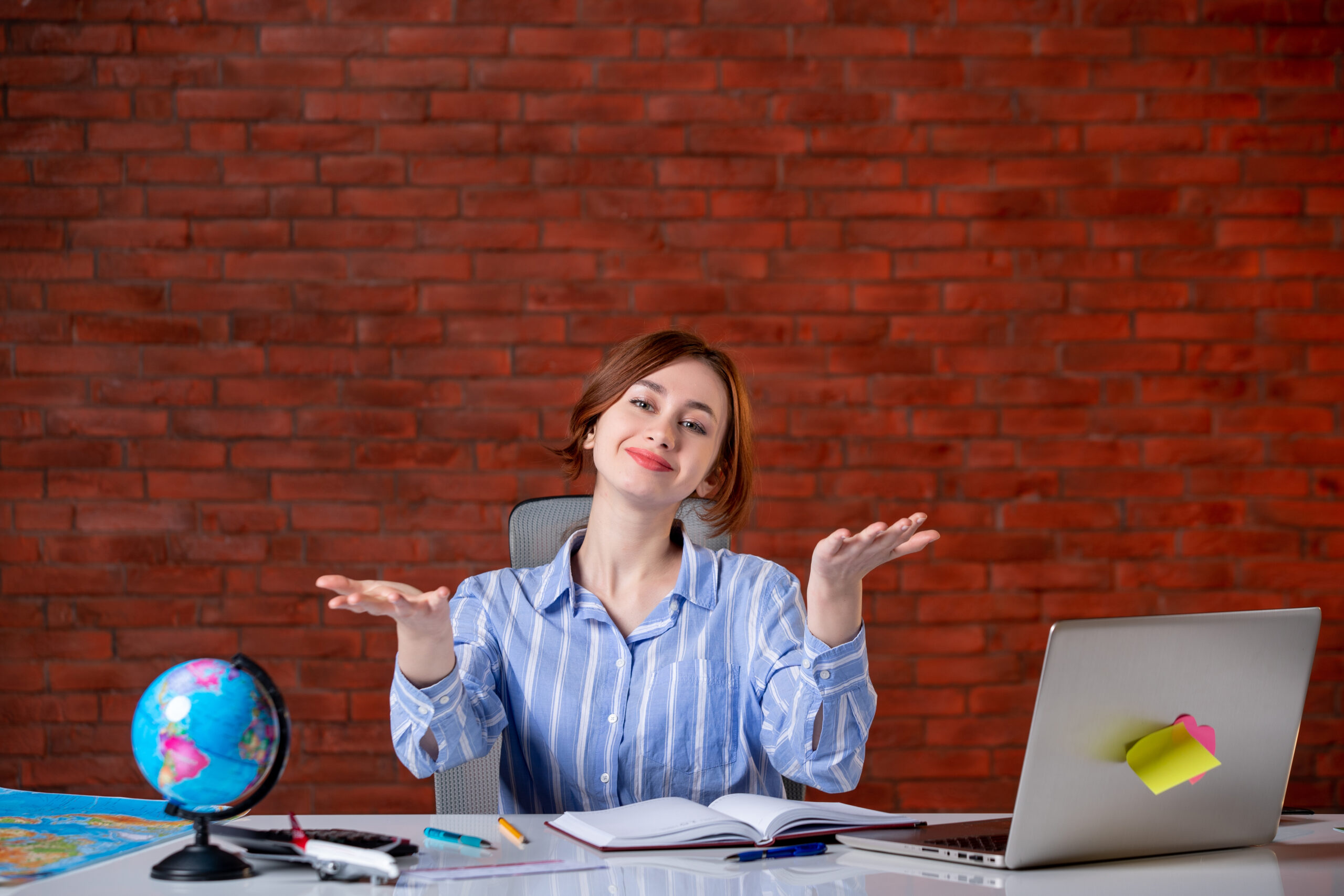 front-view-travel-agent-her-working-place-map-indoors-manager-operator-agency-world-document-service-occupation-worker